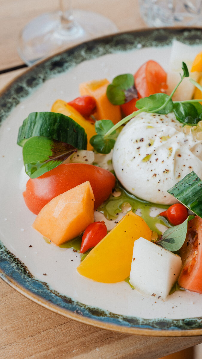 Burrata di bufala aux tomates et melon
